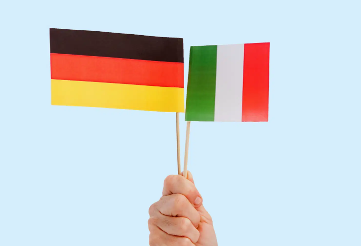 German flag and Italian flag [Photography]. Shutterstock on money.com, 2015.